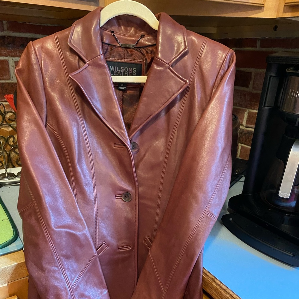 Burgundy Wilson leather jacket. Size small. Never worn.